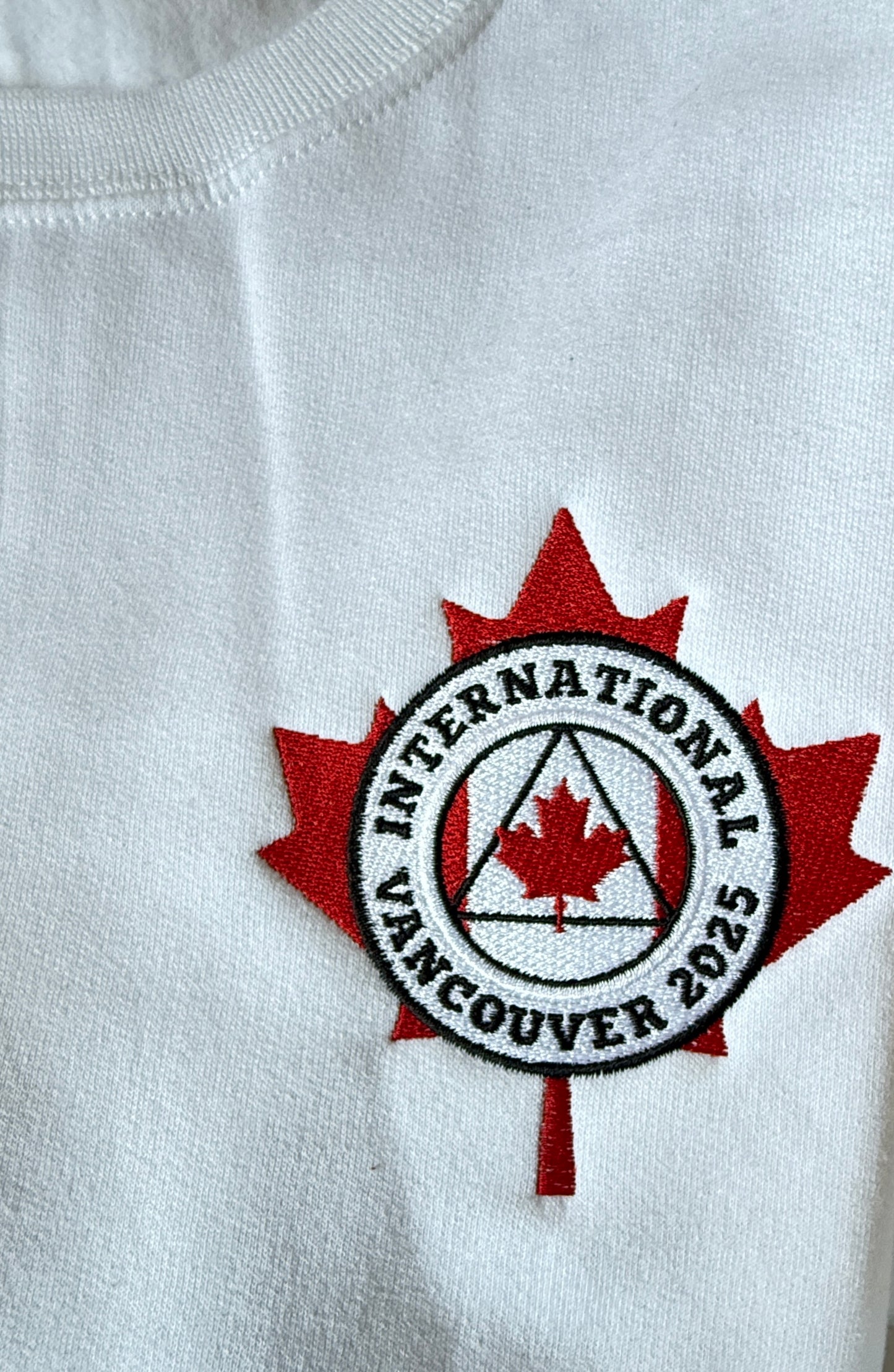 White Embroidered Crewneck Maple Leaf Sweatshirt - International Convention 2025!
